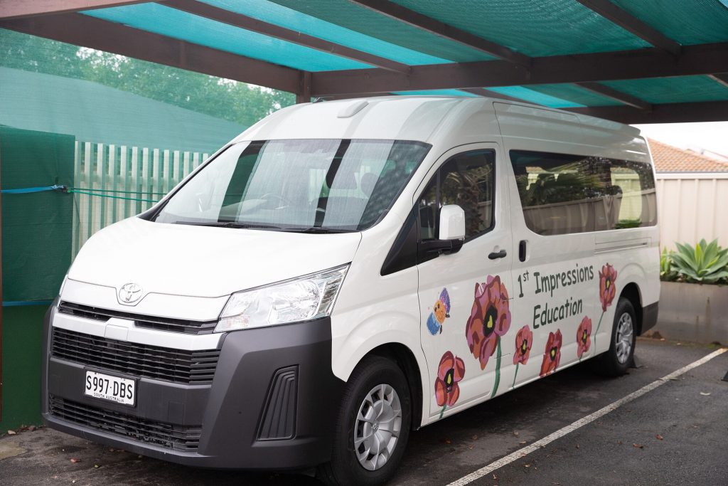 The 1st Impressions Early Learning Centre bus outside the Nailsworth centre